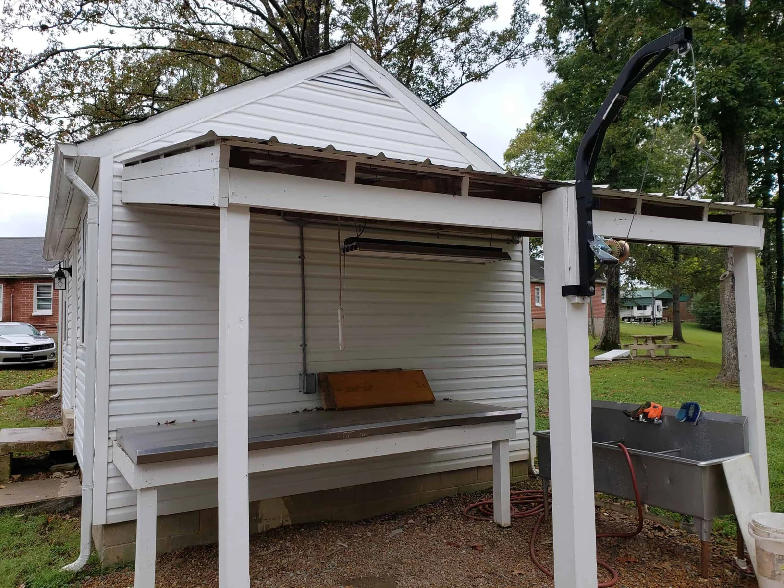 Covered fish-cleaning station at Early American Motel