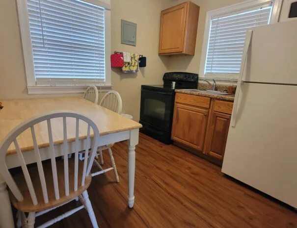 The Double Cabin’s full kitchen, with stove, refrigerator and dining table